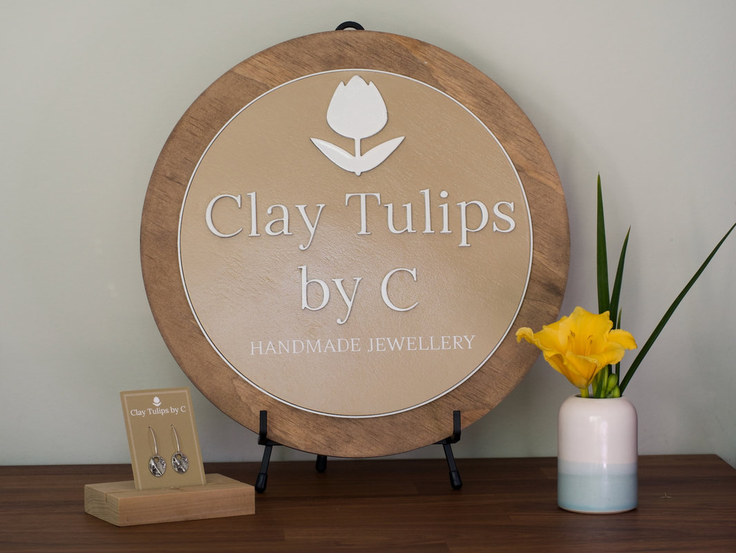 Clay Tulips by C Logo Sign