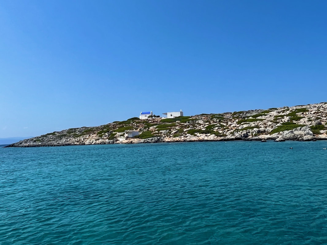 Blue and White Greek Church on edge of Dia Island