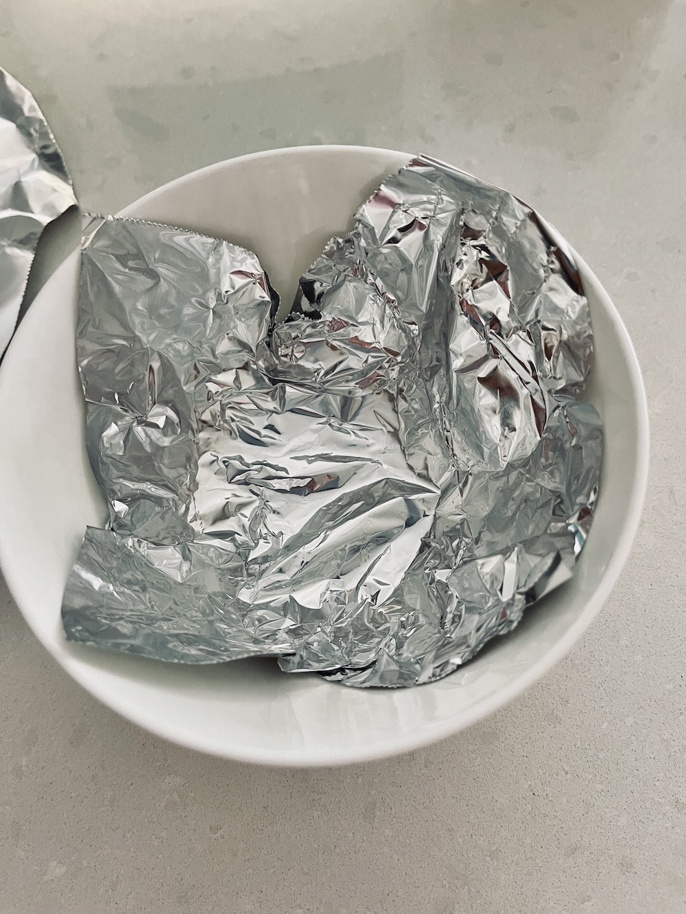 aluminum foil added to bowl
